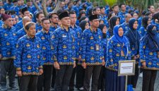 Ilustrasi ASN dengan batik Korpri. (Dok. Kementerian Pariwisata)